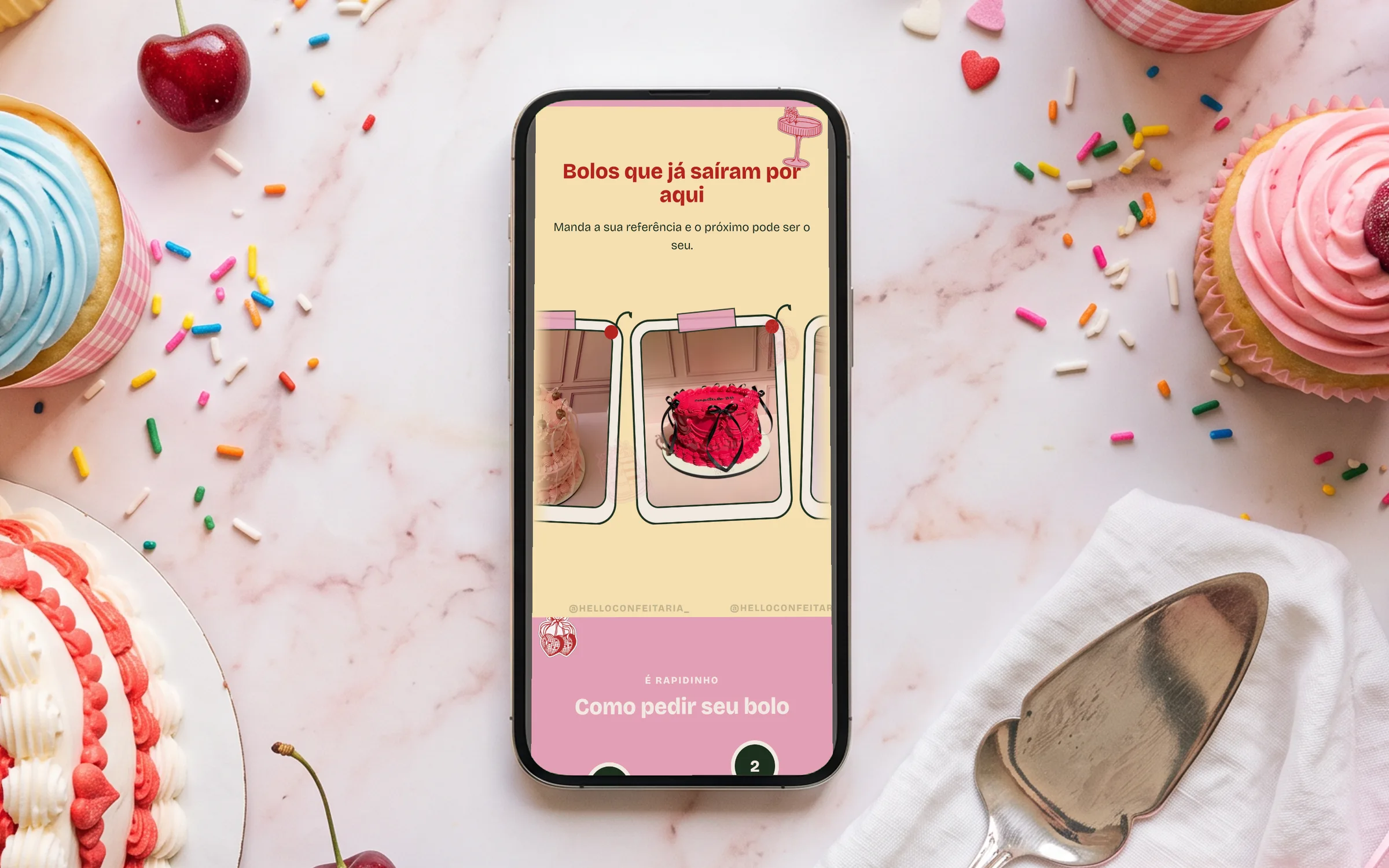 Celular sobre mármore com a galeria de bolos que já saíram da Hello